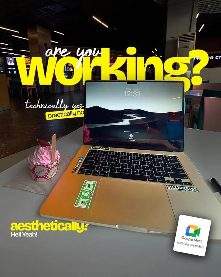 Team working at desks in the studio